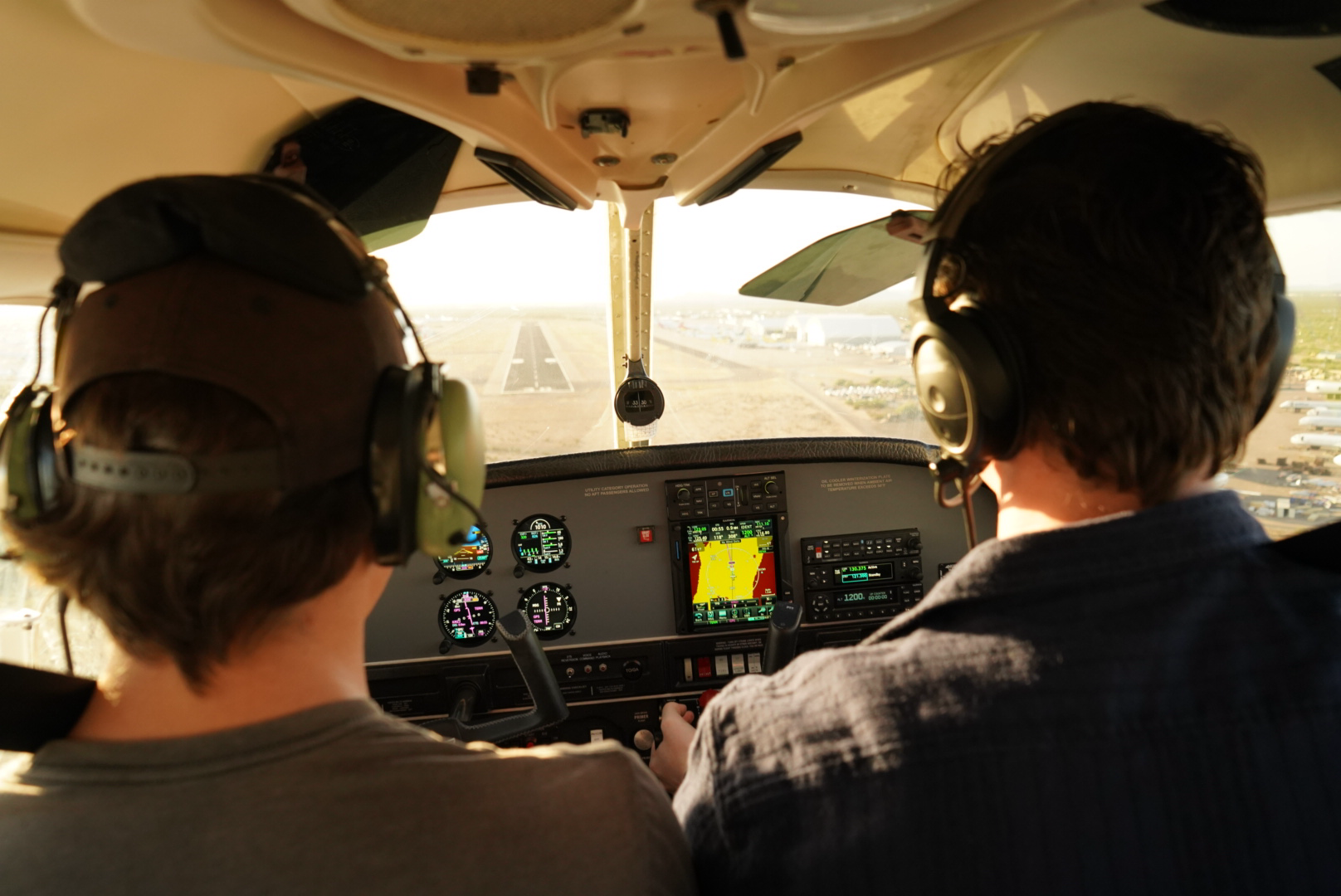 Approach to landing at sunset